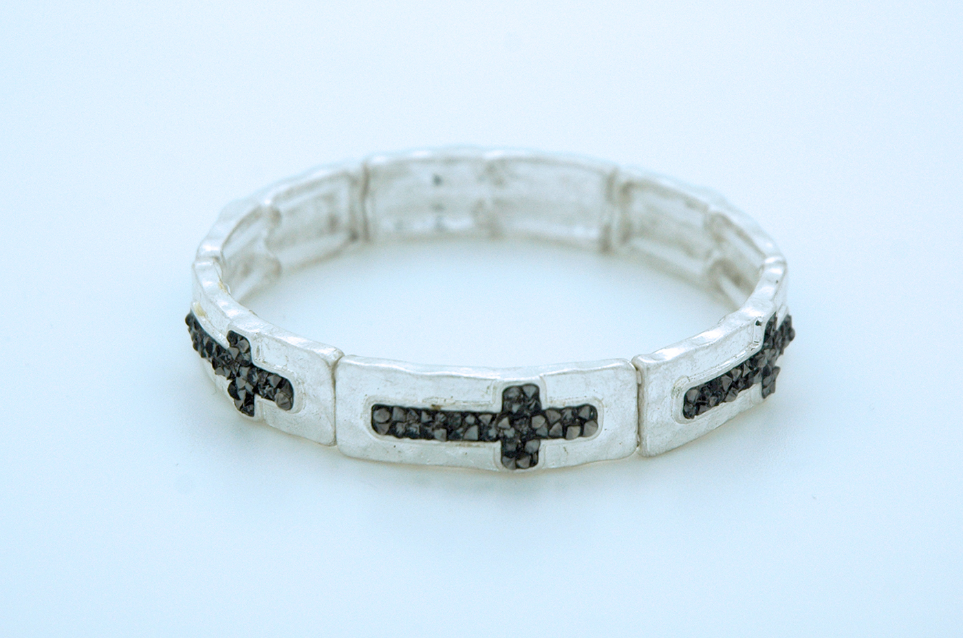 CU5843 - Thin Silver Bracelet, Small Hematite Colored Crystal Crosses