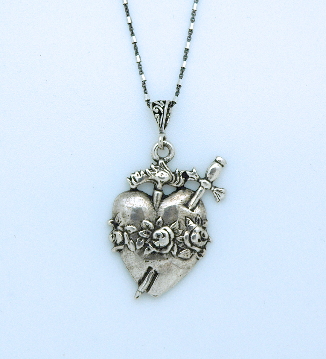 SSN99 - Sterling Silver Heart with Sword on Sterling Silver Chain