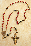 BRR1 - Antiqued Bronze Rosary, Genuine Ruby Beads, Infant of Prague Center